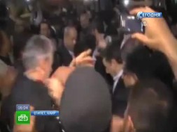 Сириец бросался в Ахмадинежада ботинком из толпы