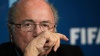 Президент ФИФА Блаттер уходит в отставку после скандала и переизбрания