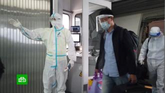 В Китае зафиксировали рекордный рост числа зараженных коронавирусом