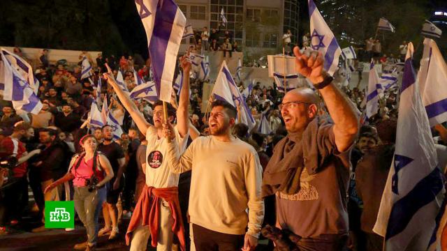 Протесты в Израиле: граждане требуют от властей полностью отказаться от судебной реформы.Израиль, беспорядки, забастовки, митинги и протесты, полиция, суды.НТВ.Ru: новости, видео, программы телеканала НТВ