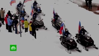 Праздничный парад снегоходов прошел в Антарктиде и Арктике 