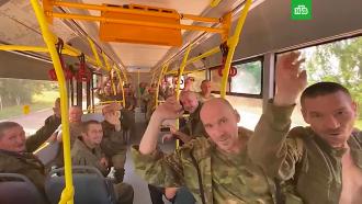 Минобороны показало возвращение российских военных из украинского плена
